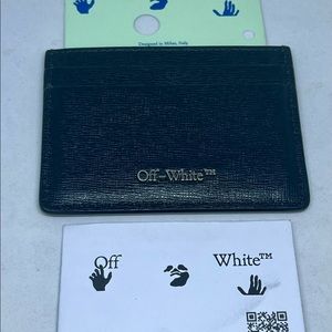 Sold——Off White card holder. New and in excellent condition. Black and white.
